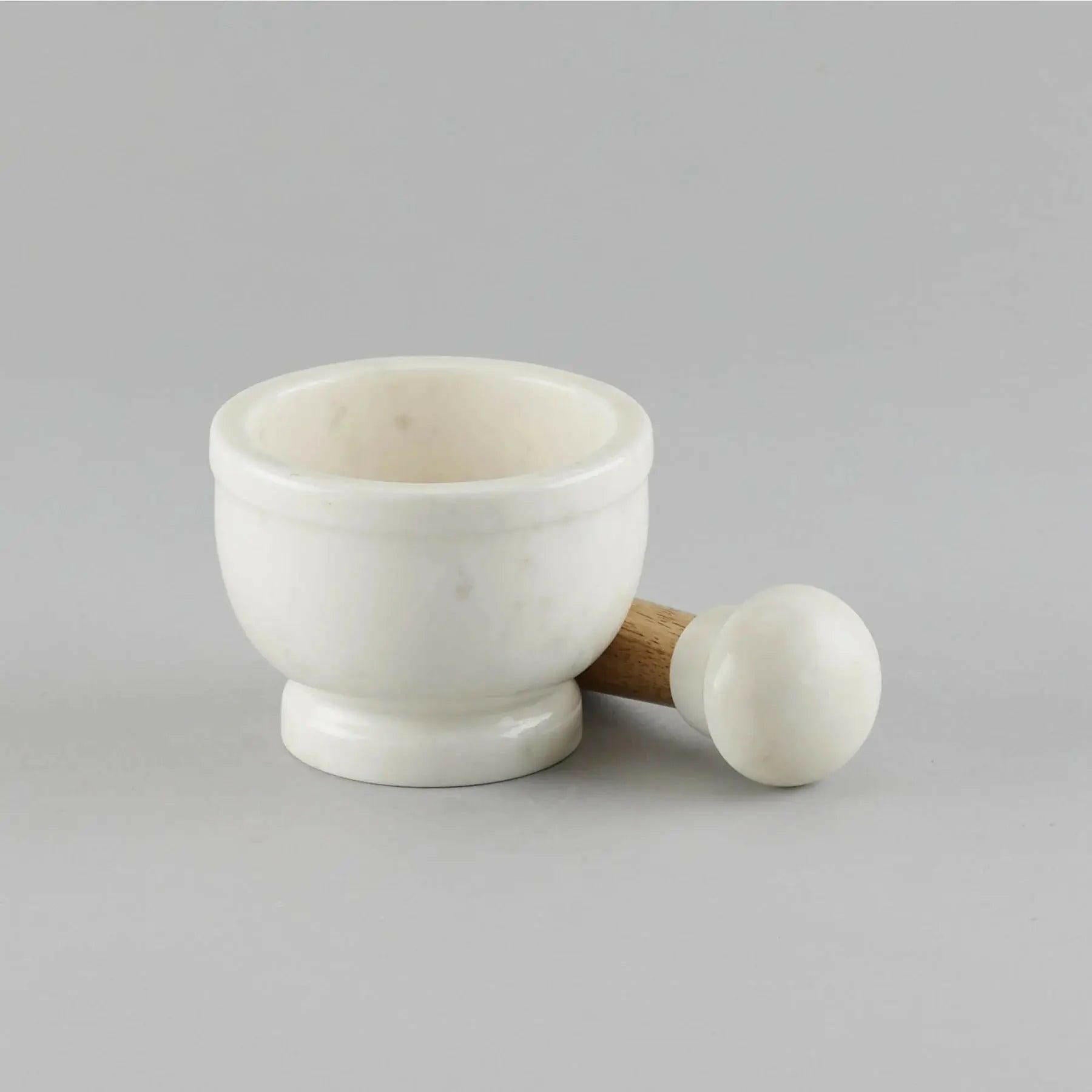 White Marble Pestle and Wood Mortar Pestle Set.