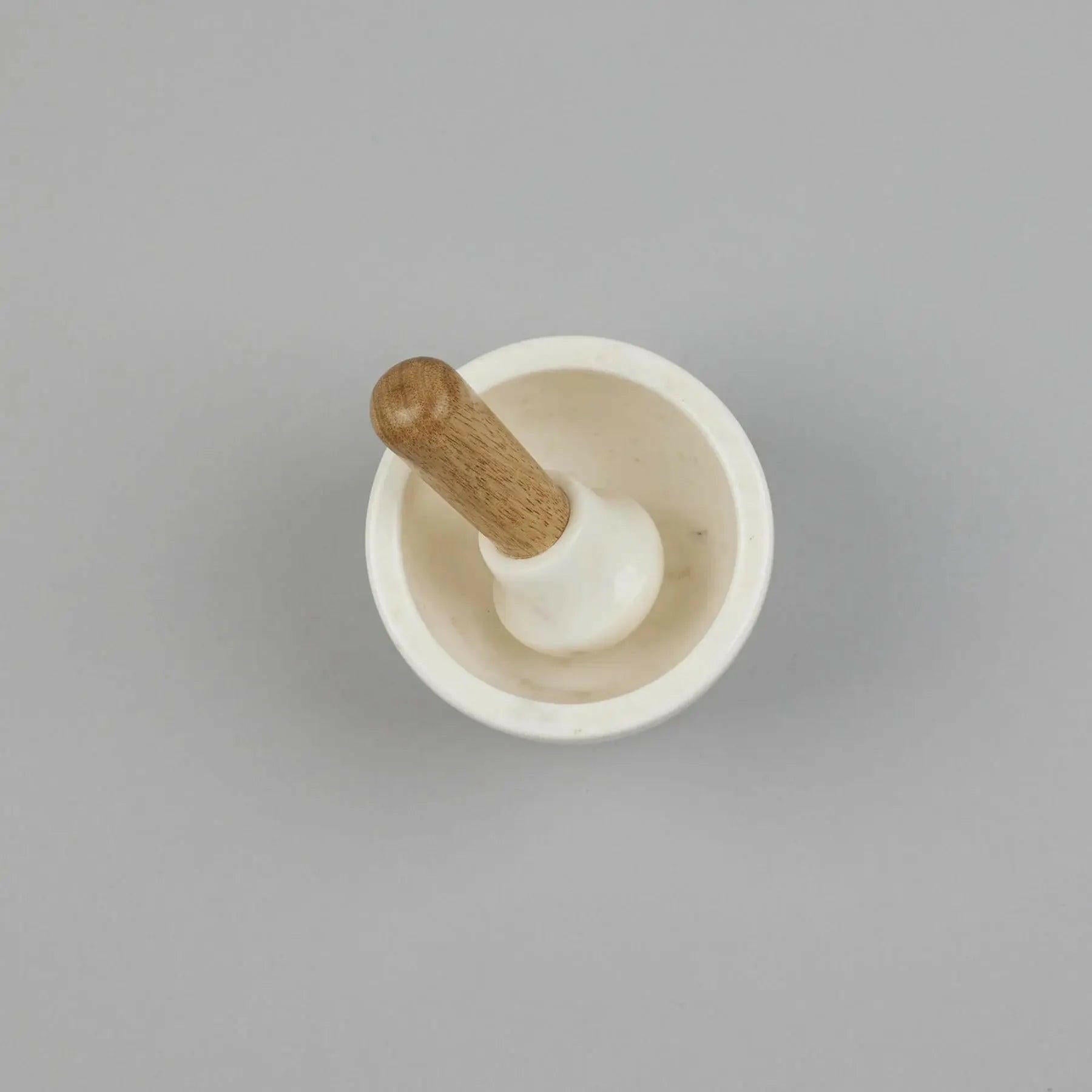 White Marble Pestle and Wood Mortar Pestle Set.