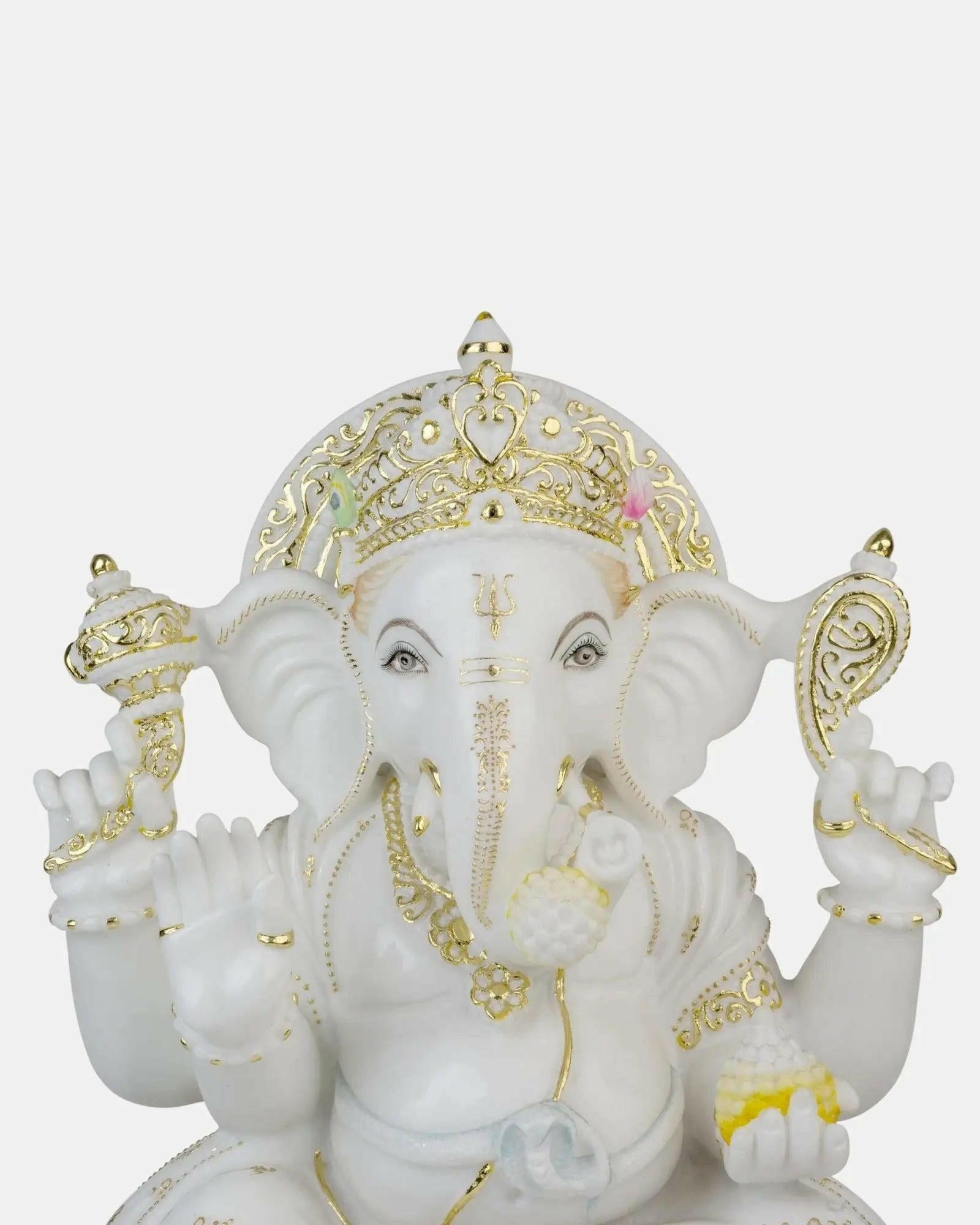 White Marble Lord Ganesha with Gold Trim.