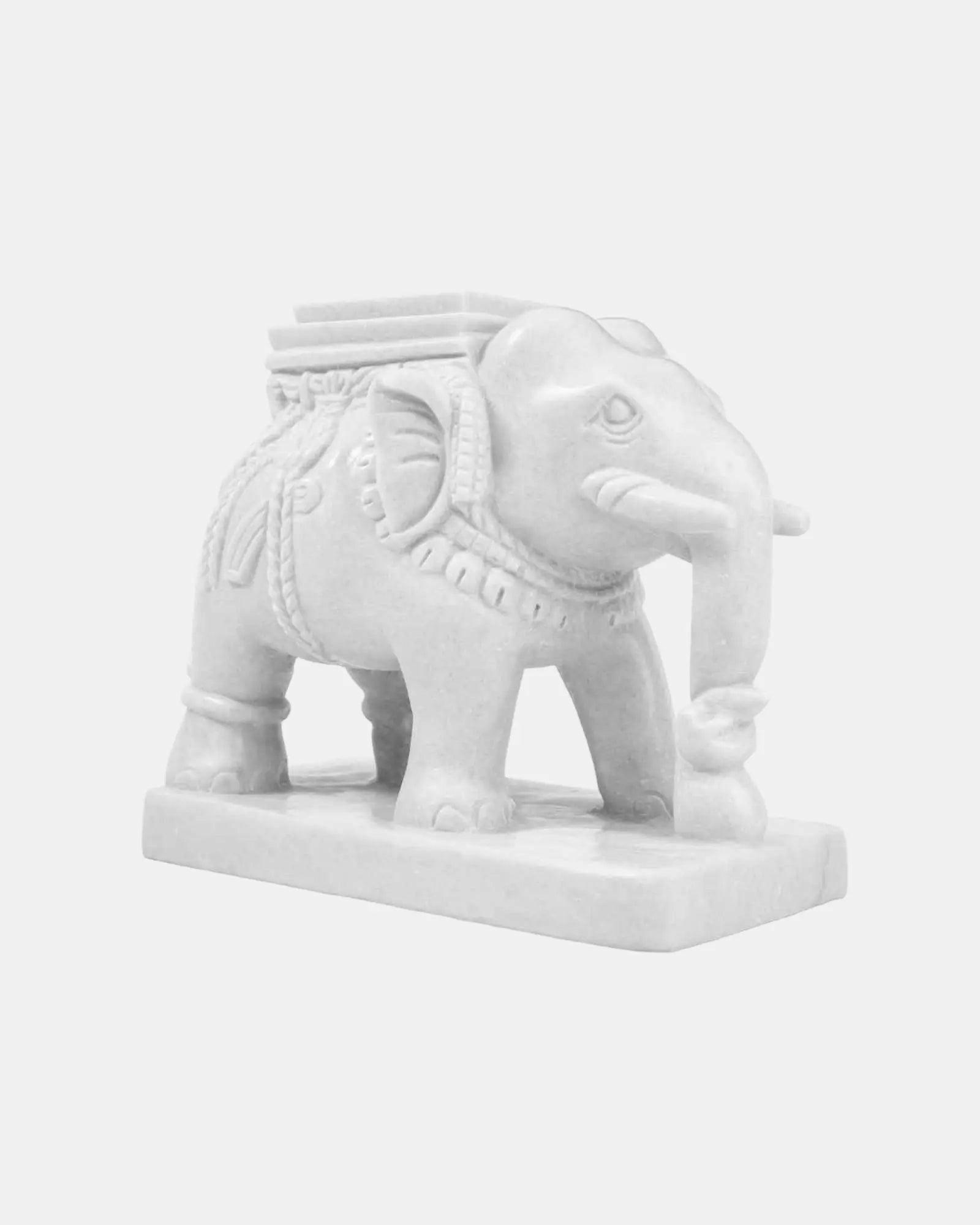 Intricate Hand-Carved Marble Elephant Set.